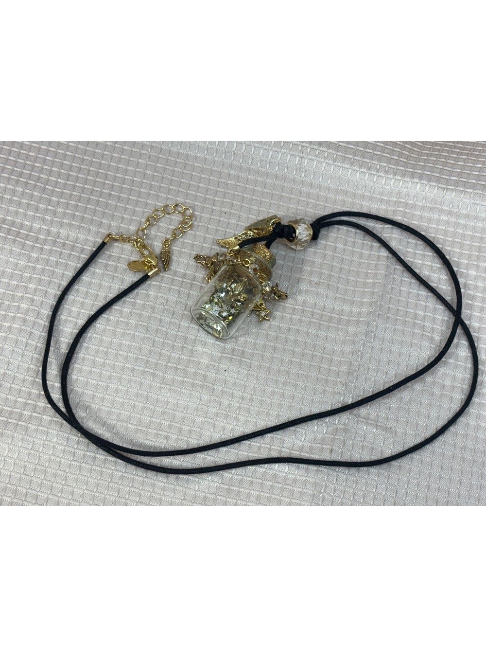 Kirks Folly vintage "Angel Dust" or "Folly Dust" bottle necklace